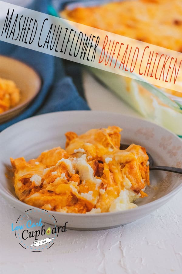 Low carb mashed cauliflower buffalo chicken keto recipe. An easy keto casserole that is delicious and easy to make. Creamy and spicy recipe. #ketobuffalochicken #mashedcauliflower