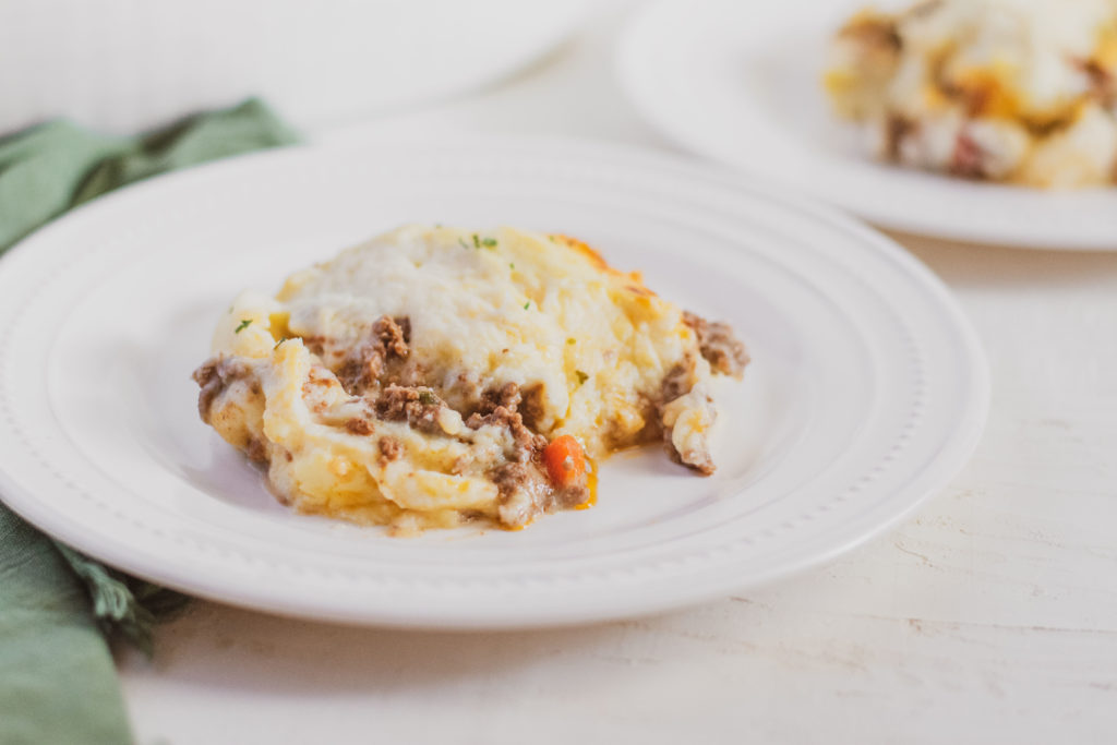 Low carb shepherd's pie serving on a white plate.