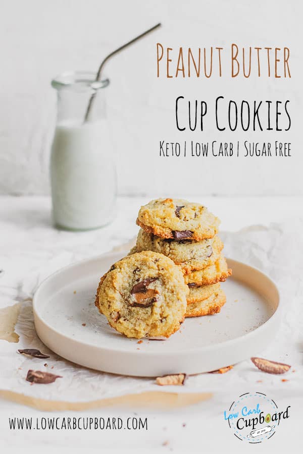 Easy to make keto Peanut Butter Cup Cookies recipe. These ooey gooey low carb cookies are a delicious peanut butter and chocolate dessert! #ketocookies #ketodessert #peanutbuttercookies 