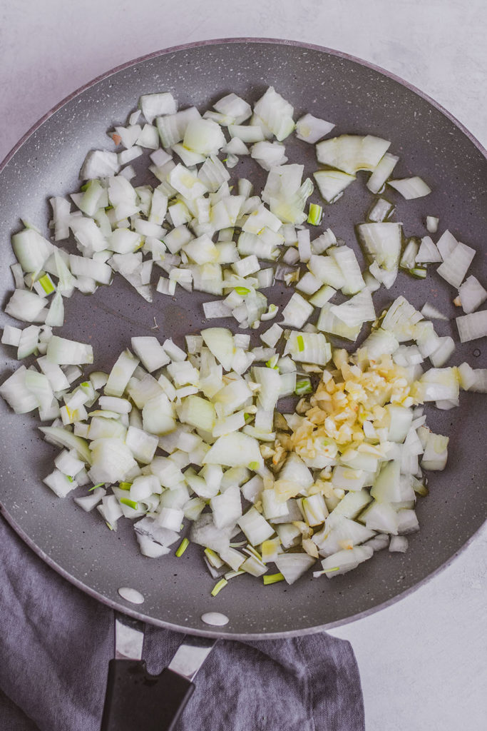 Keto Stuffed Bell Peppers sautéed onions and garlic
